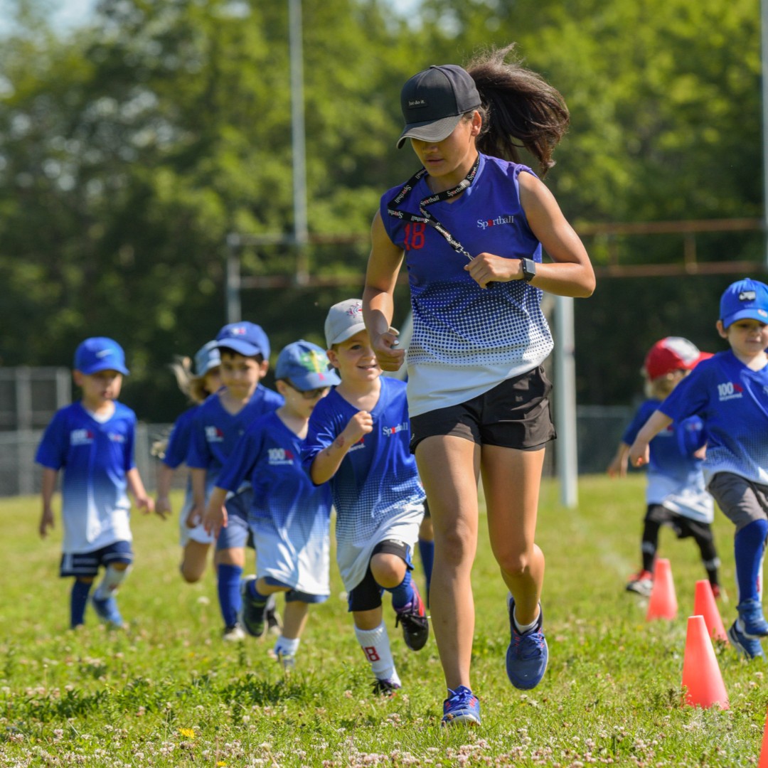 sportball branded kids running HQ